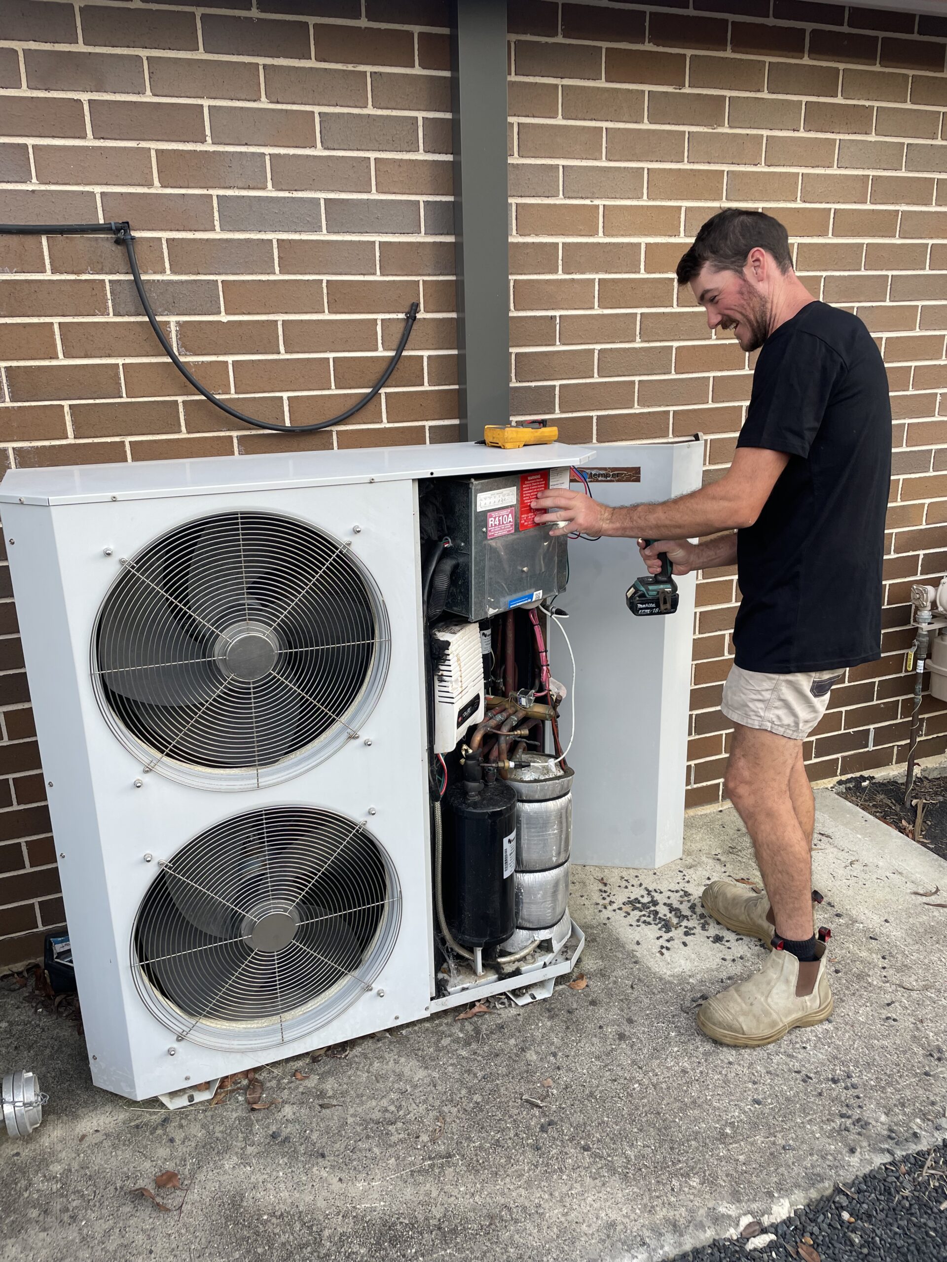 Electrician installing Air Conditioner