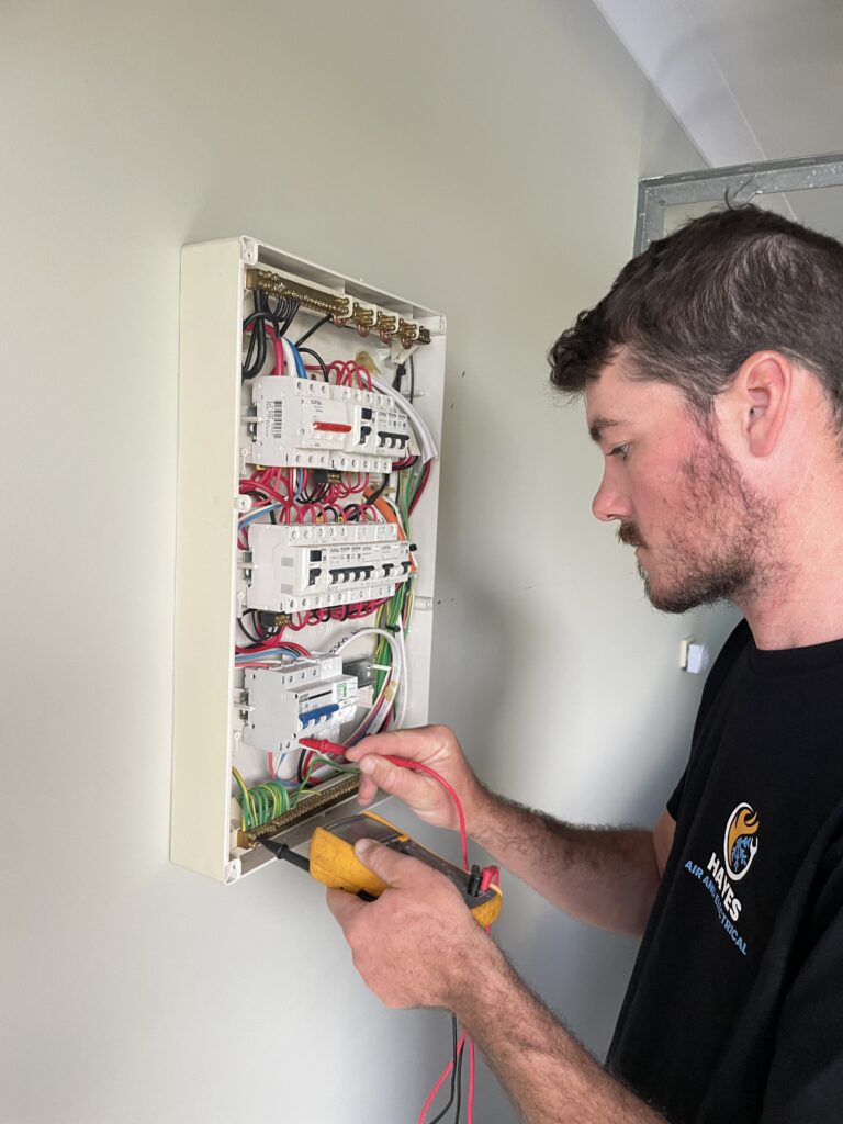 Electrician wiring swtichboard